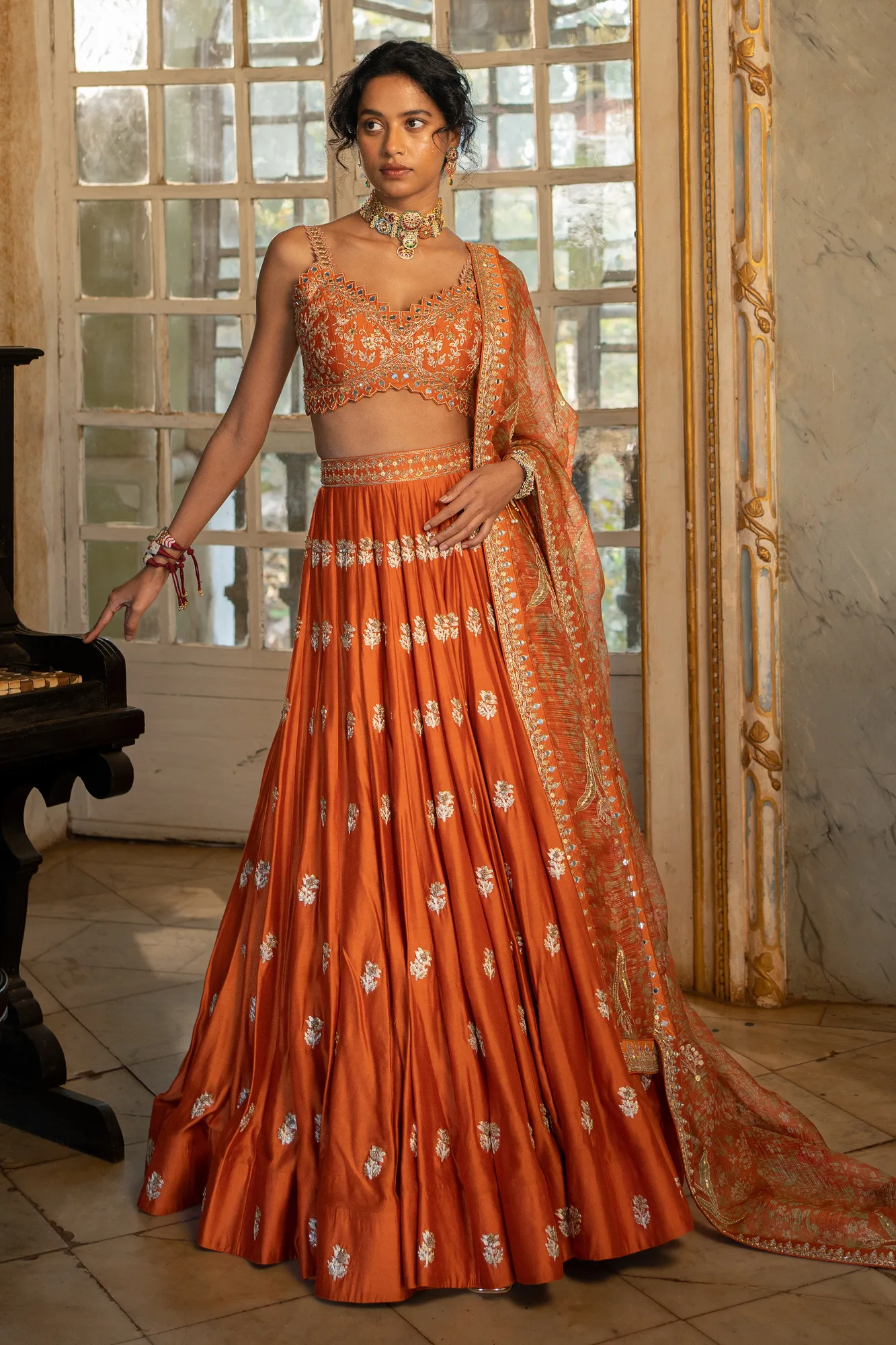 Nimrit Lehenga Set by Paulmi And Harsh in rust