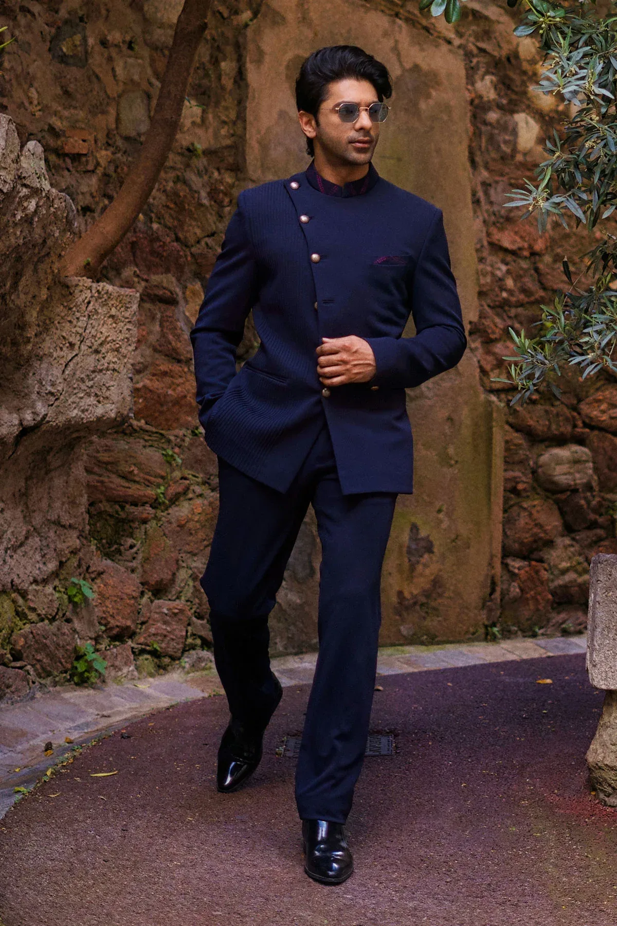 Taaha Shah in Navy Blue bandhgala set by Sarab Khanijou