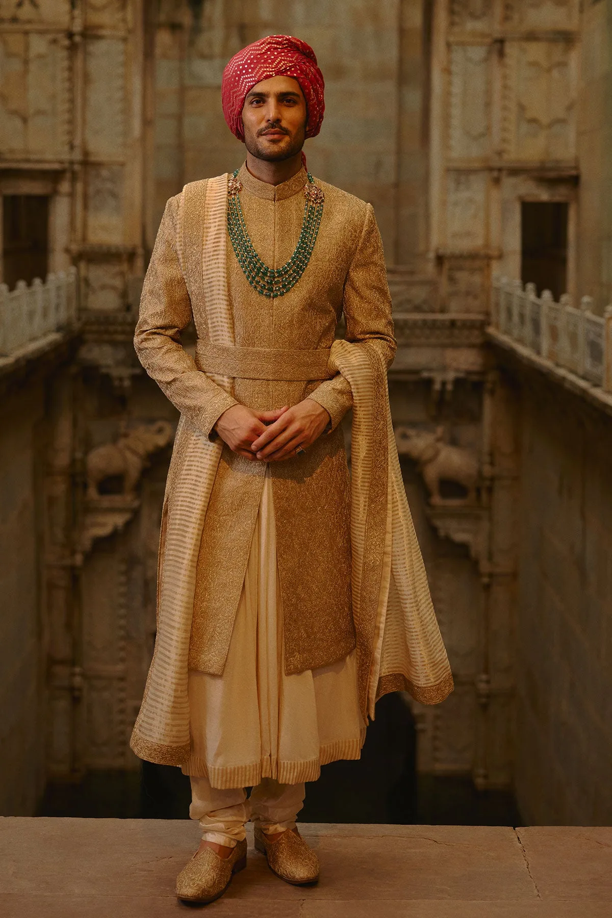 Salmon Pink Sherwani Set by Nitika Gujral