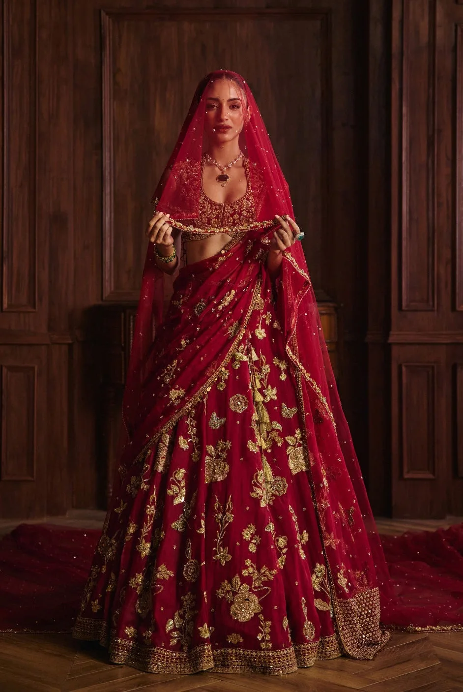 Nooran by Mahima Mahajan, crimson lehenga