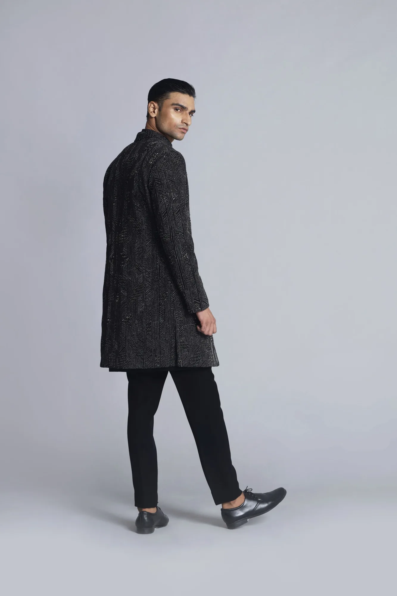 Black sandwash with silver highlights indo western set by Sarab Khanijou