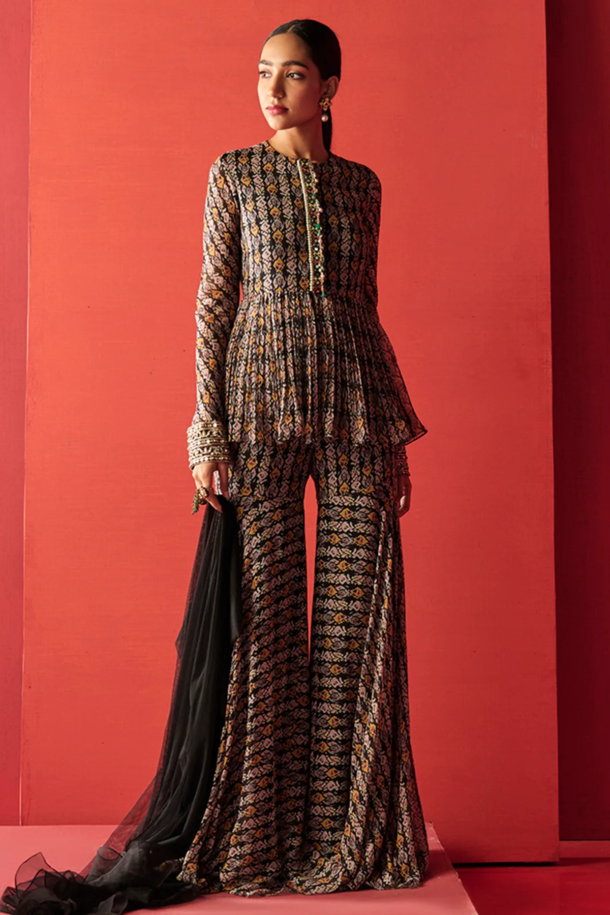 Shezan by Ridhi Mehra, black sharara