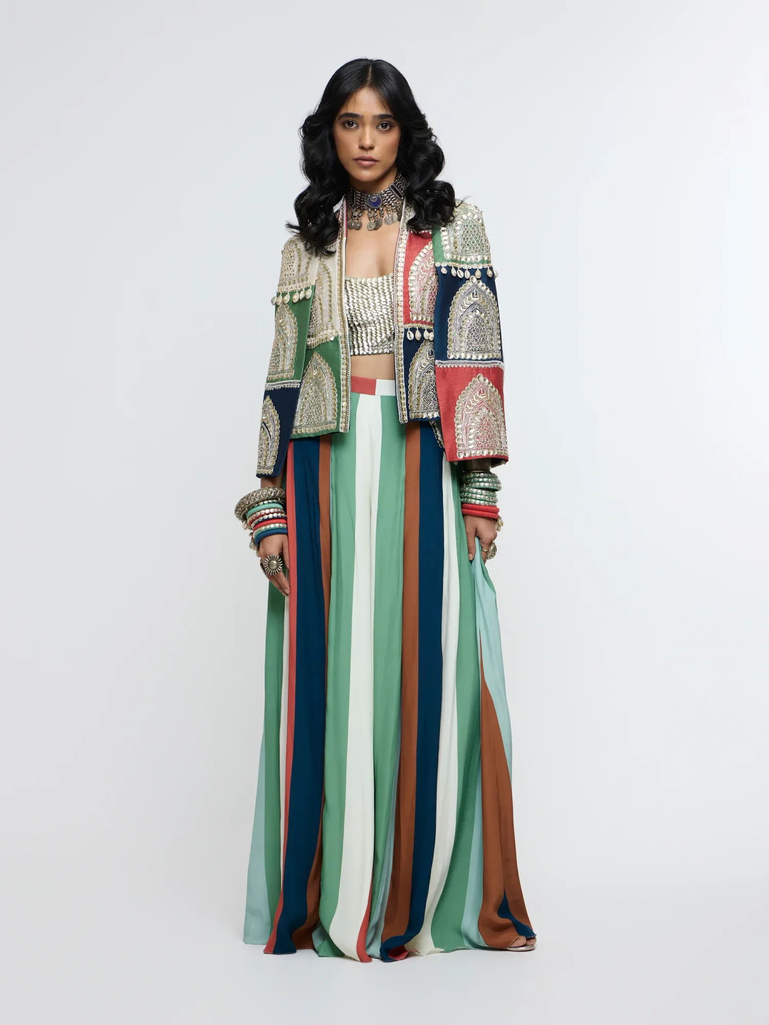 Rajrangi Embellished Cape Jacket Paired with Embellished Bustier and Pleated Pants by SVA