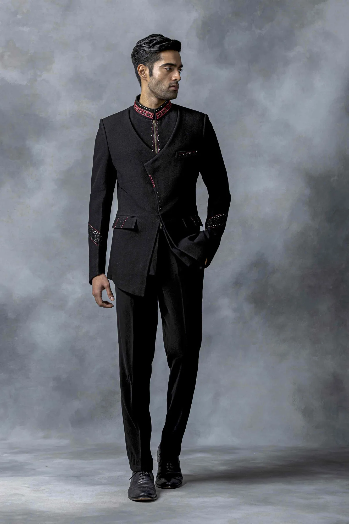 Black Bandhgala With Pink Thread And Rivet Work by Sarab Khanijou