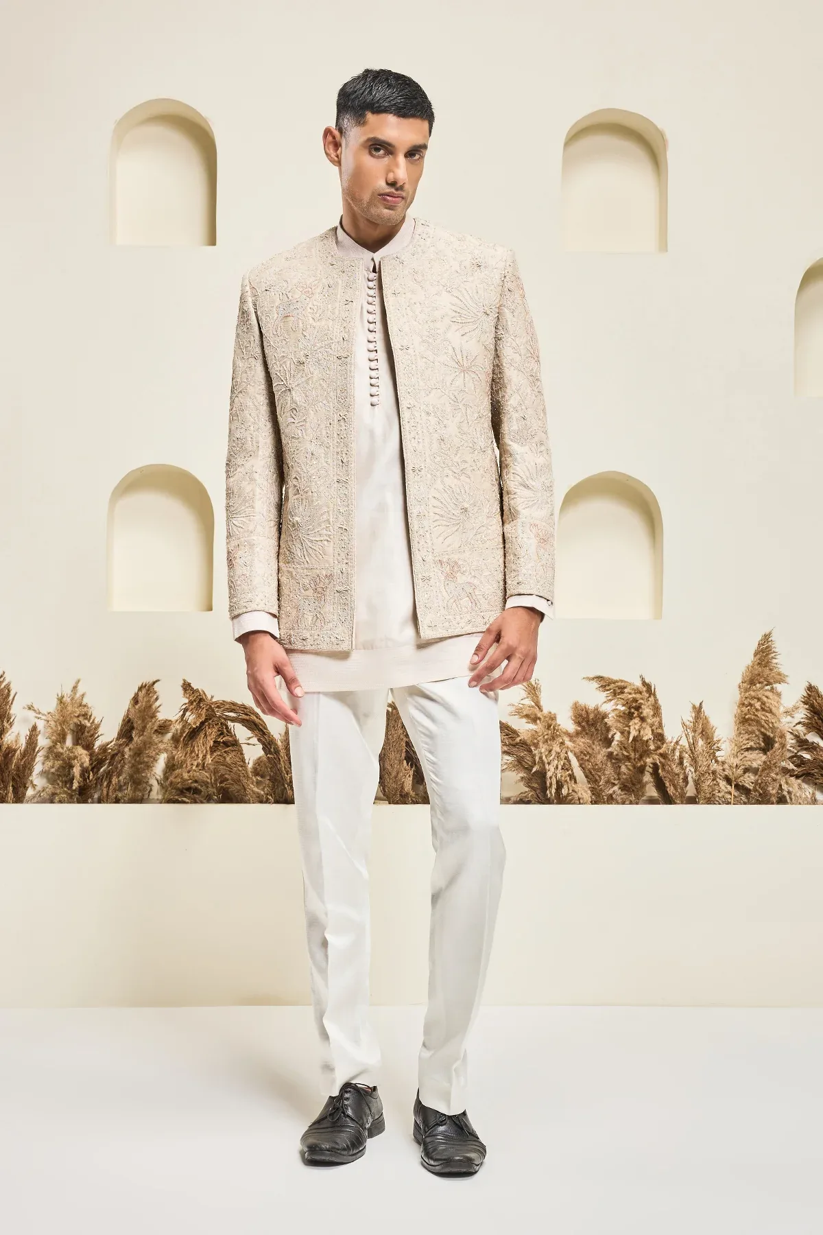 Dusty rose open bandhgala with thread sequins & pearl work by Sarab Khanijou