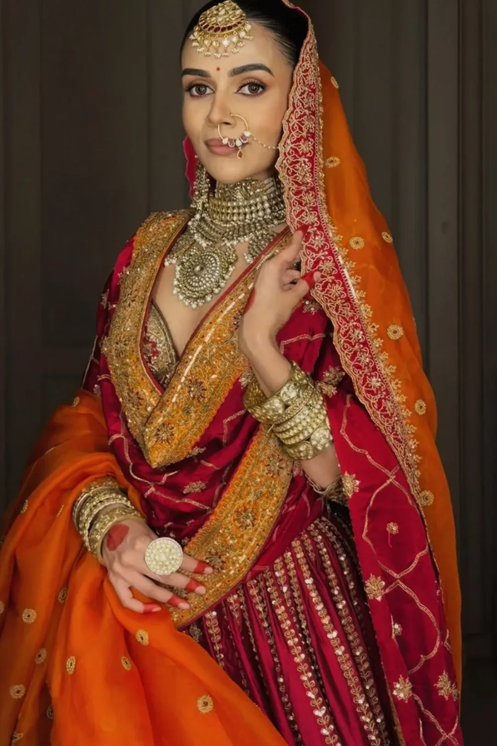 Komal Pandey in Maroon Trail Lehenga Set by Jigar Mali