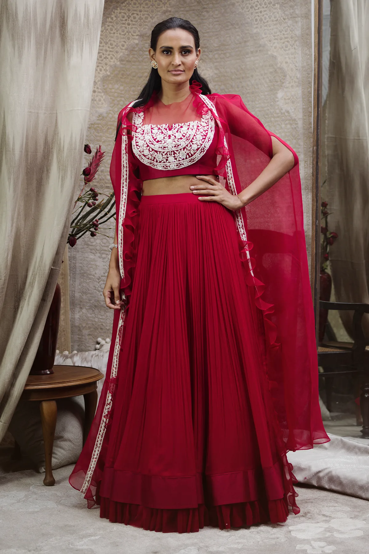 Aaila by Ridhi Mehra, red lehenga