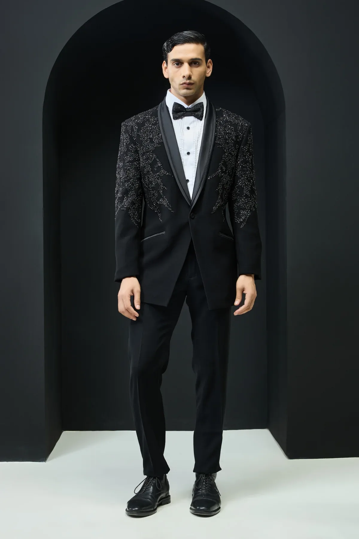 Black tuxedo highlighted with sequins pearls cutdana by Sarab Khanijou
