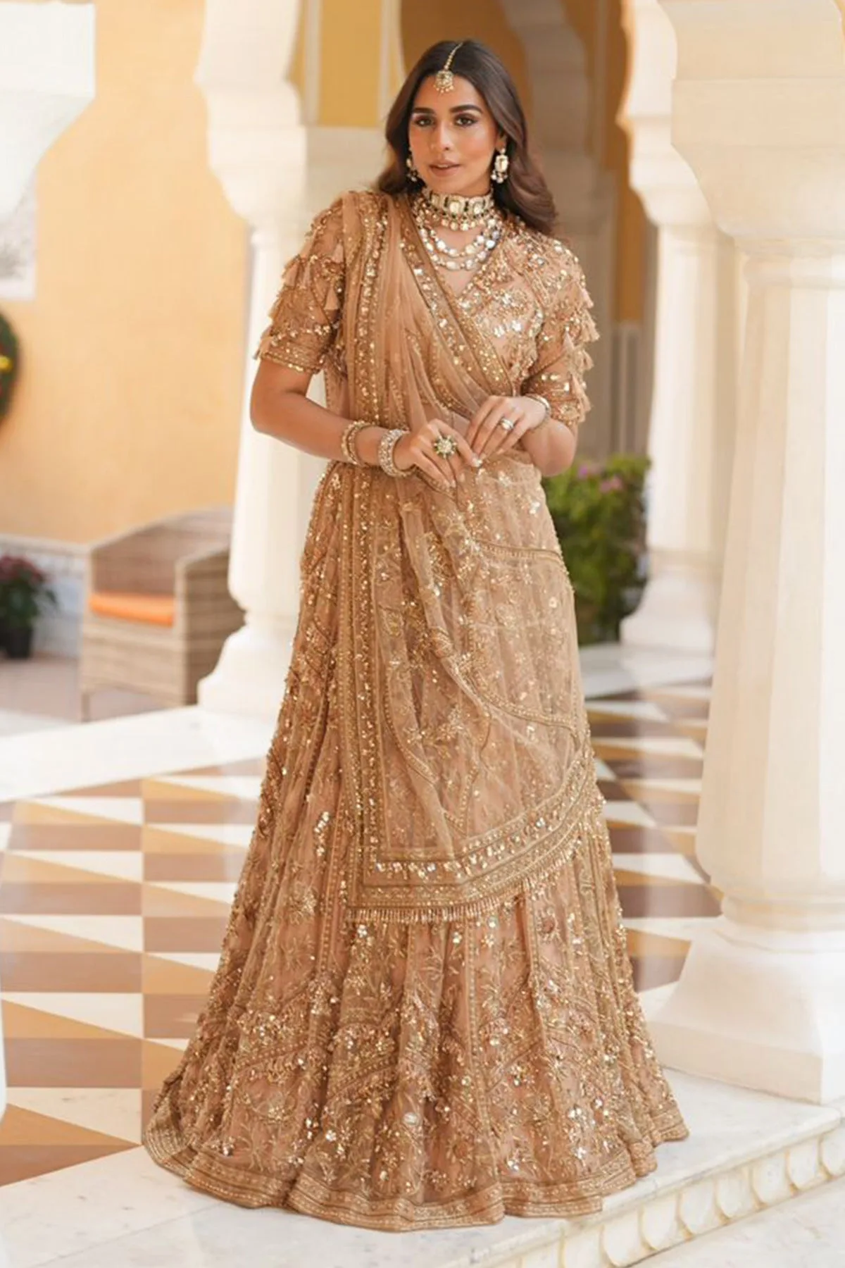 Summiya in Enchanted by Ridhi Mehra, gold lehenga