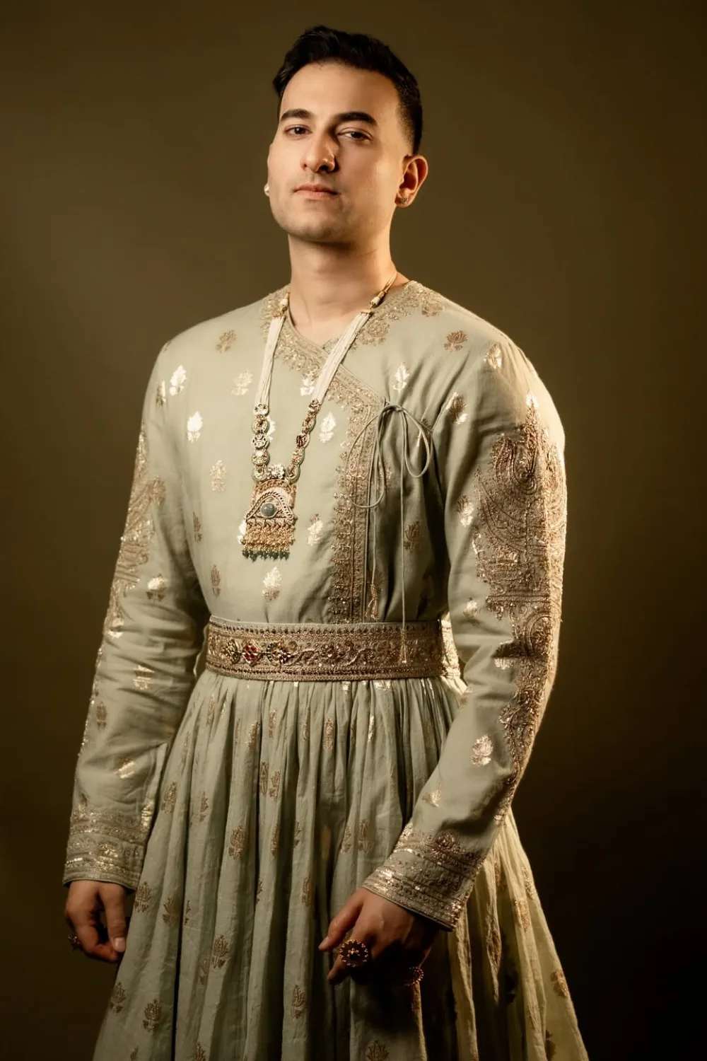 Rishabh Sharma in Sage Green Angrakha by Jigar Mali, sage green sherwani