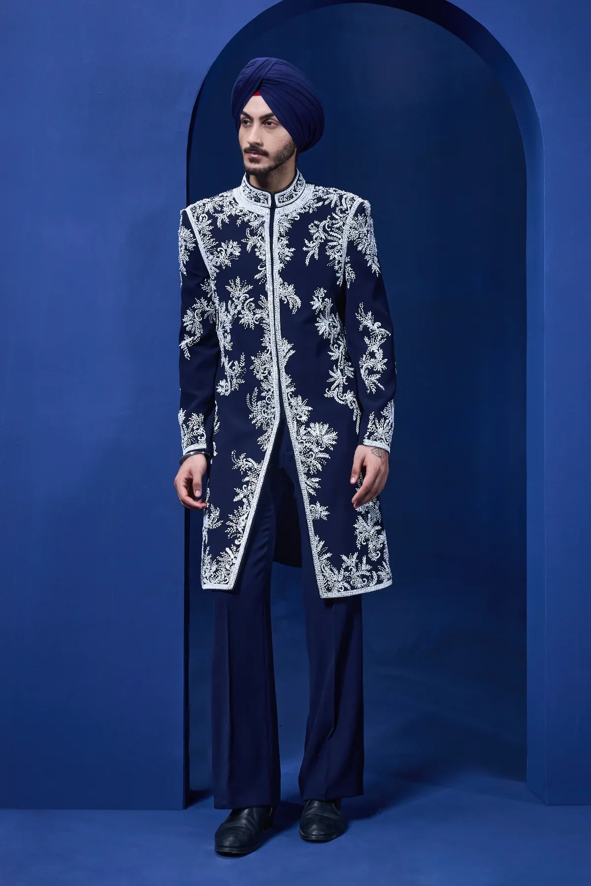 Navy blue Indo Western highlighted with sequins pearls cutdana and spring thread work by Sarab Khanijou