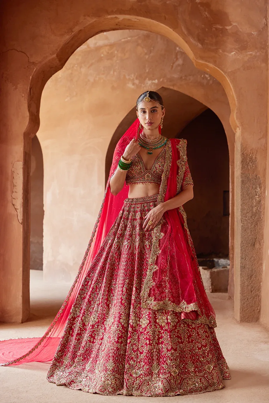 Red Raas Lehenga by Nitika Gujral