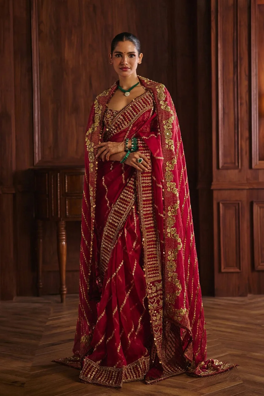 Radha by Mahima Mahajan, crimson sari