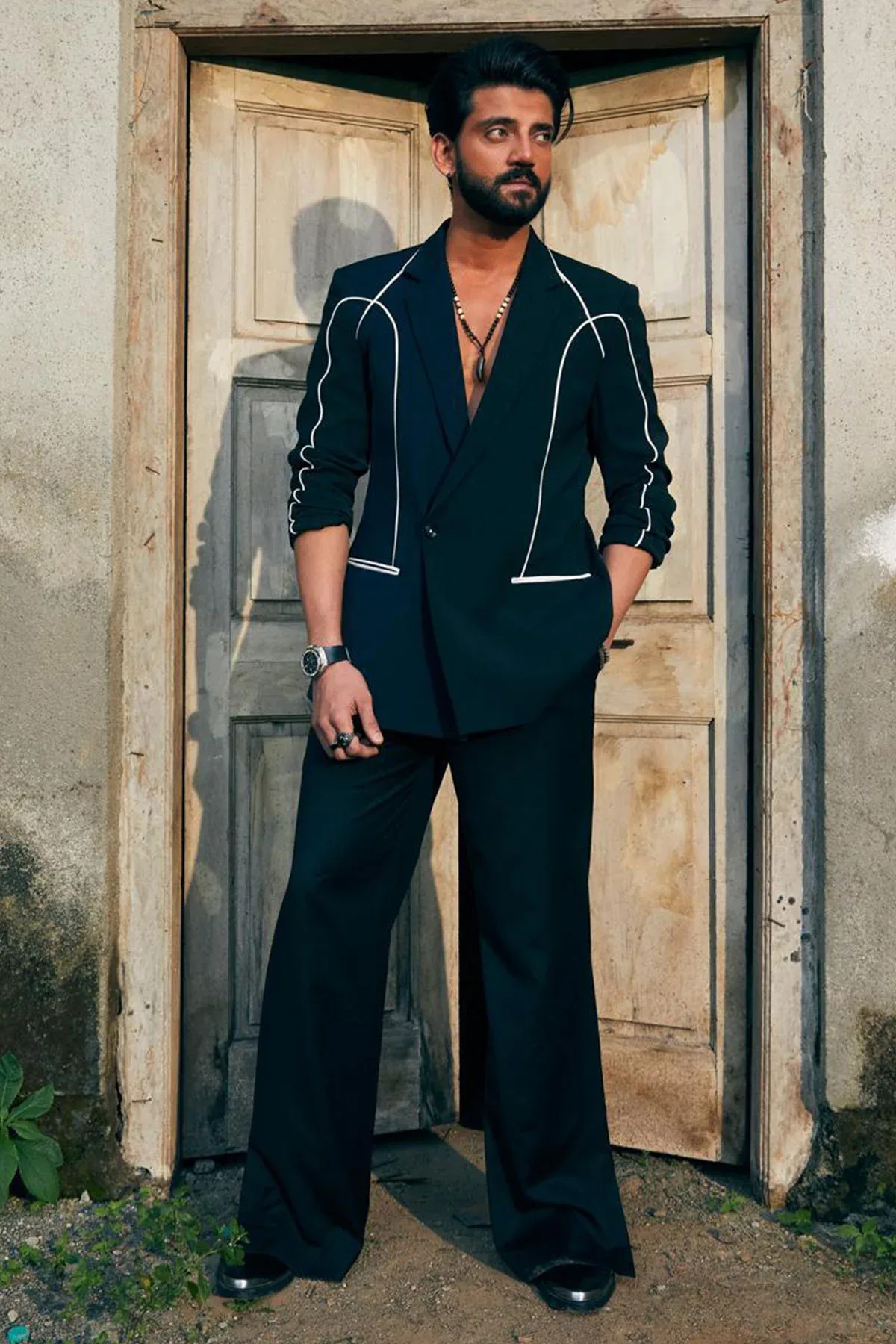 Zahir Iqbal in Navy blue and black dual colour blazer set by Sarab Khanijou