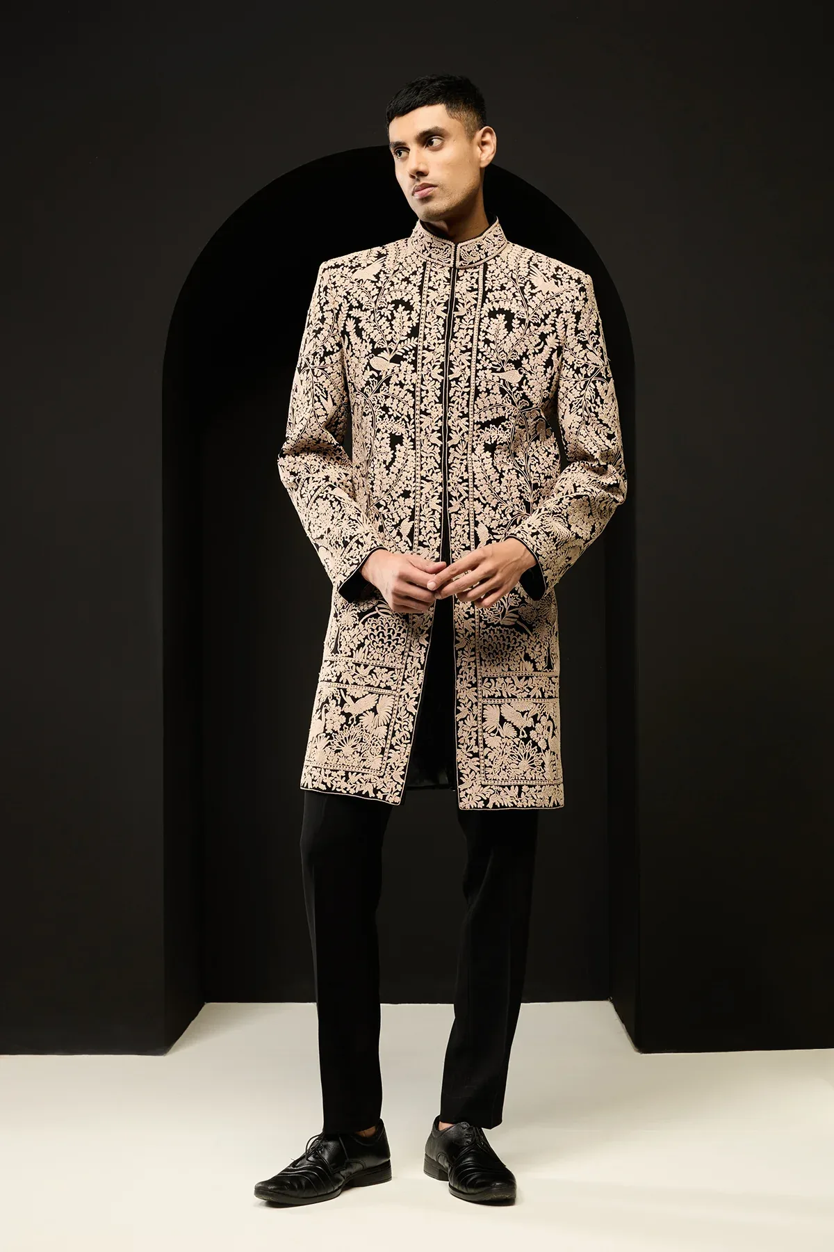 Black indowestern detailing with thread work by Sarab Khanijou