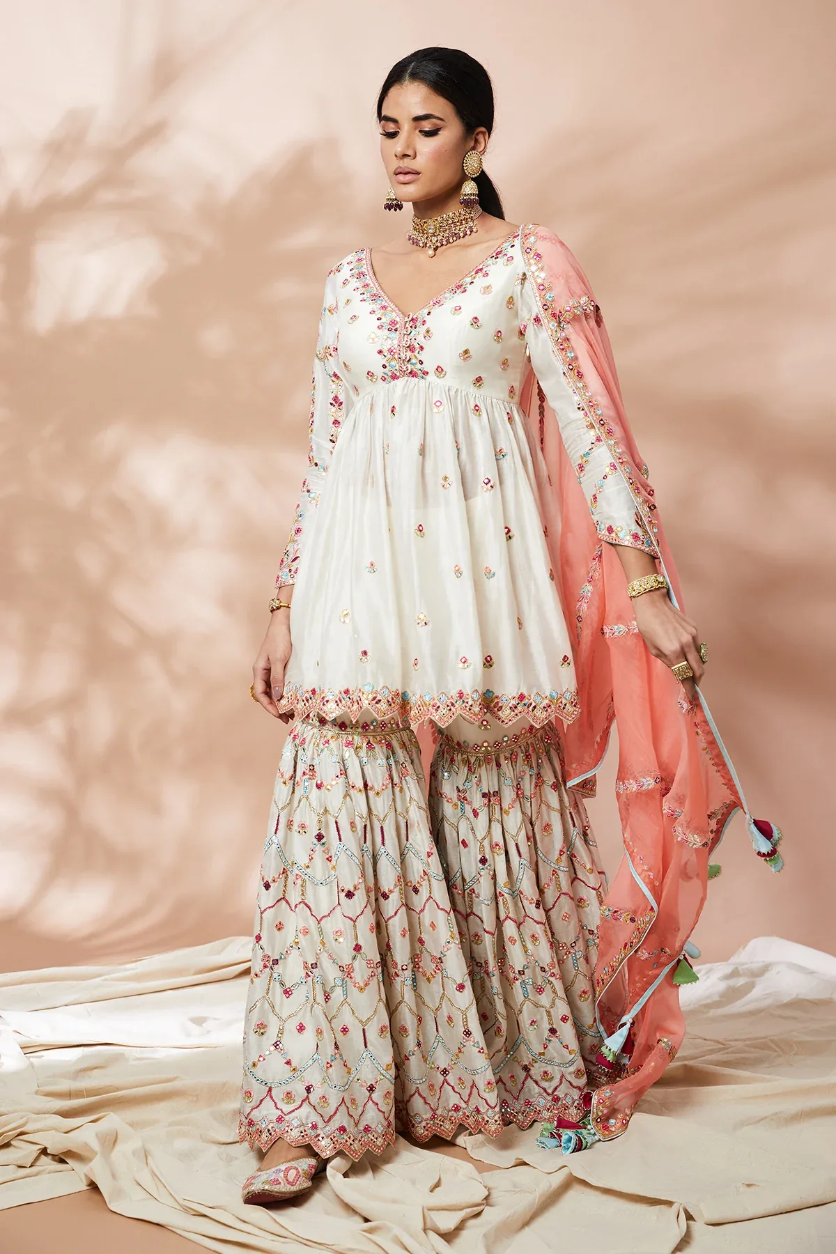 Ivory Peplum Gharara Set by Tamanna Punjabi Kapoor