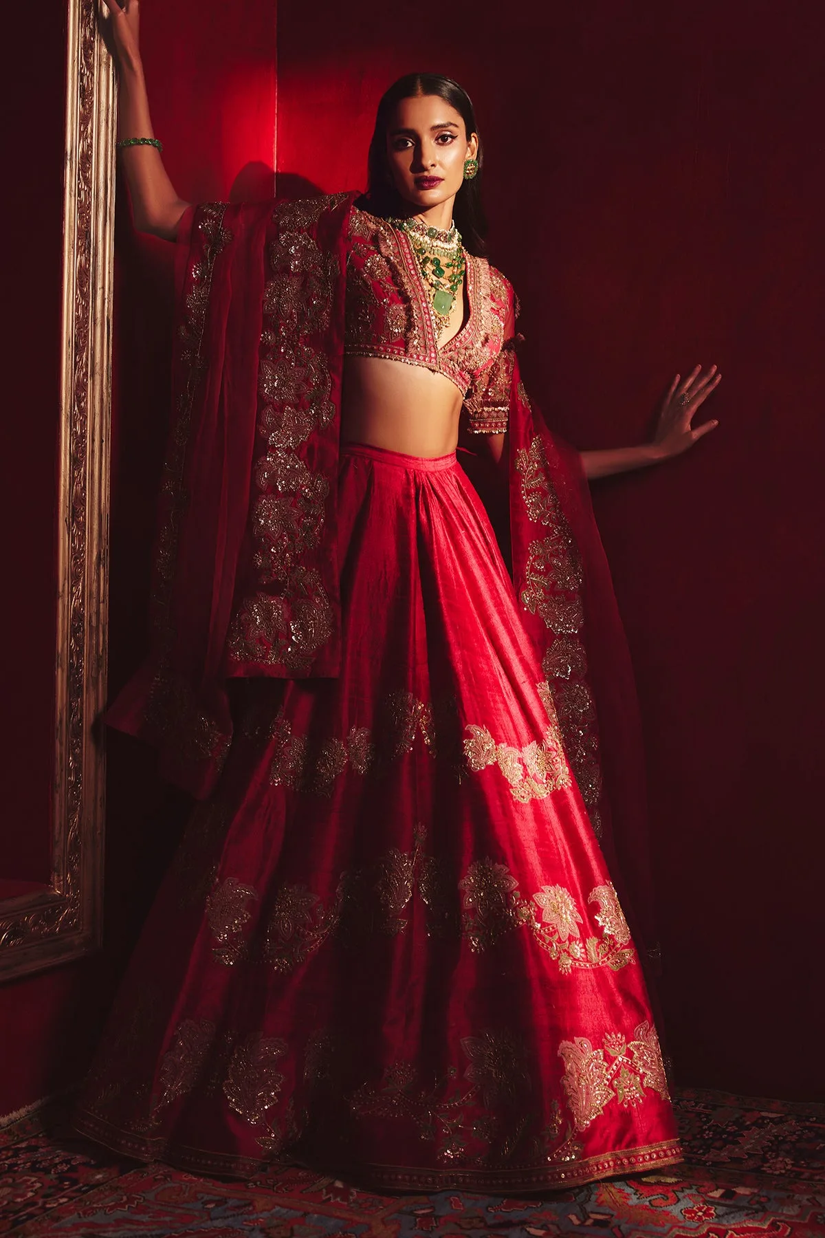 Reanna by Ridhi Mehra, red lehenga