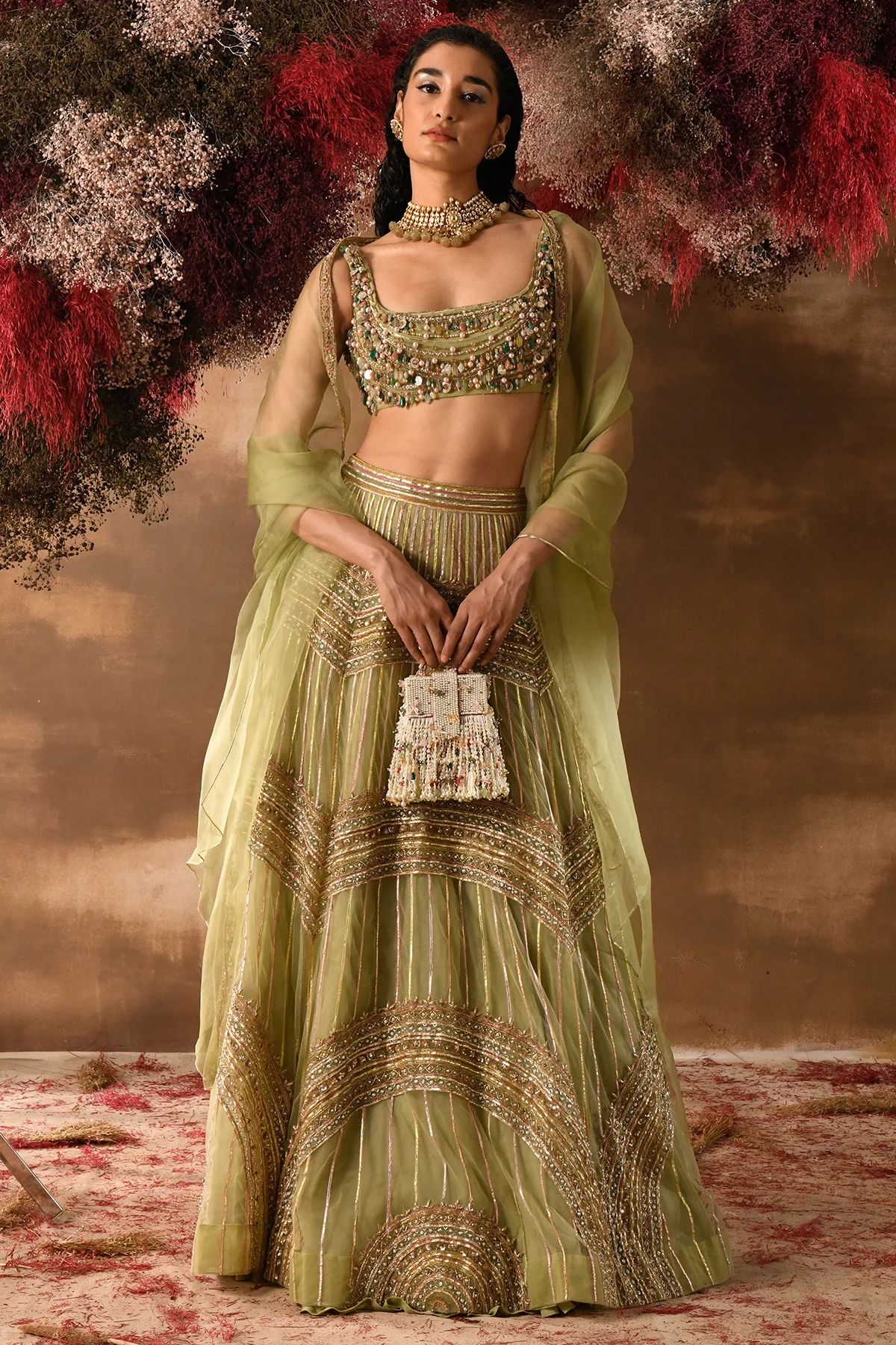 Hennah by Ridhi Mehra, green lehenga