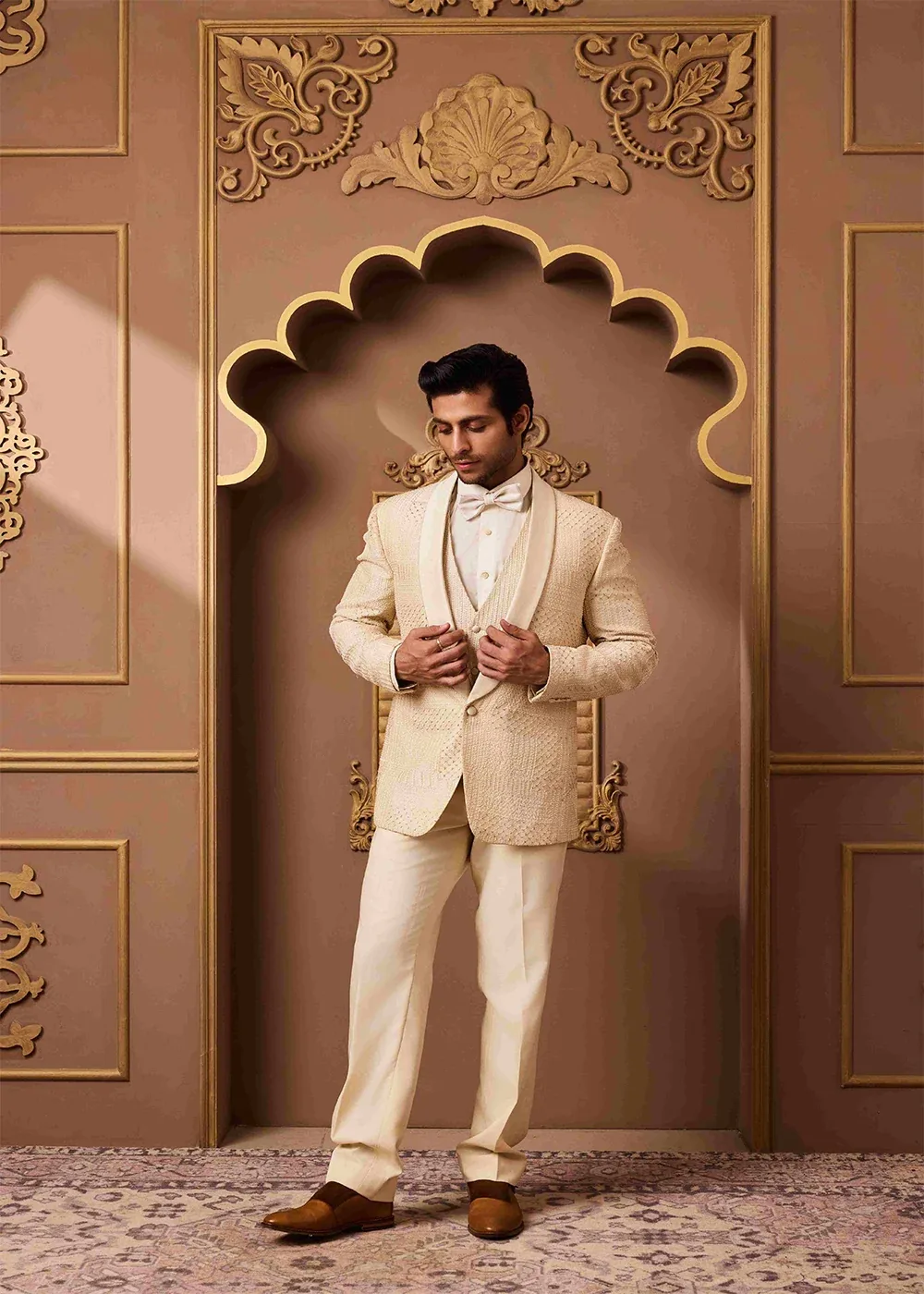 Beige Tuxedo Jacket, Waistcoat and Pant by Nitika Gujral