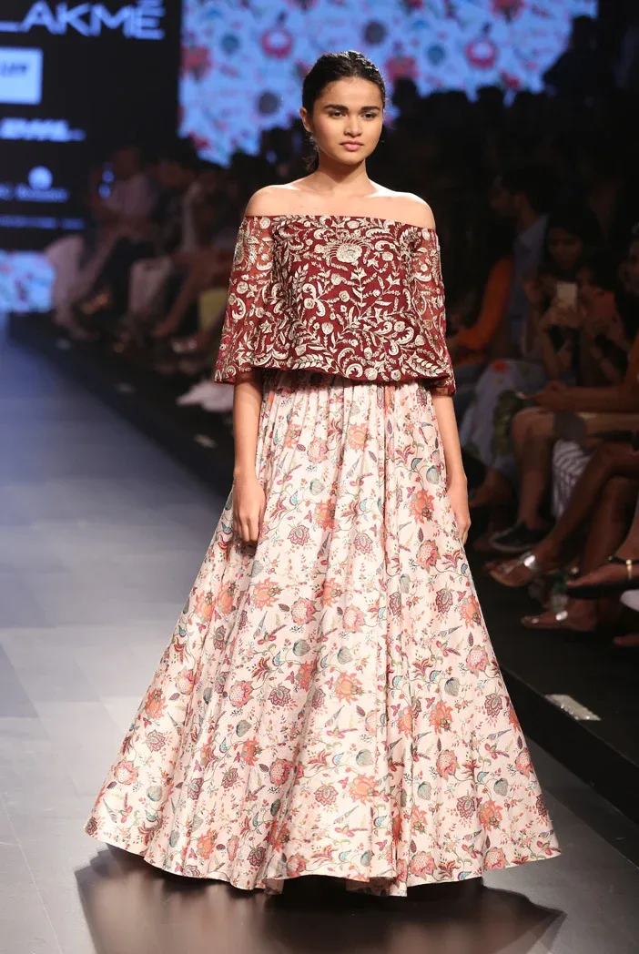 Anaar Pomegranate Organza Bell Sleeve Top with Stone Printed Dupion Silk Skirt by Payal Singhal
