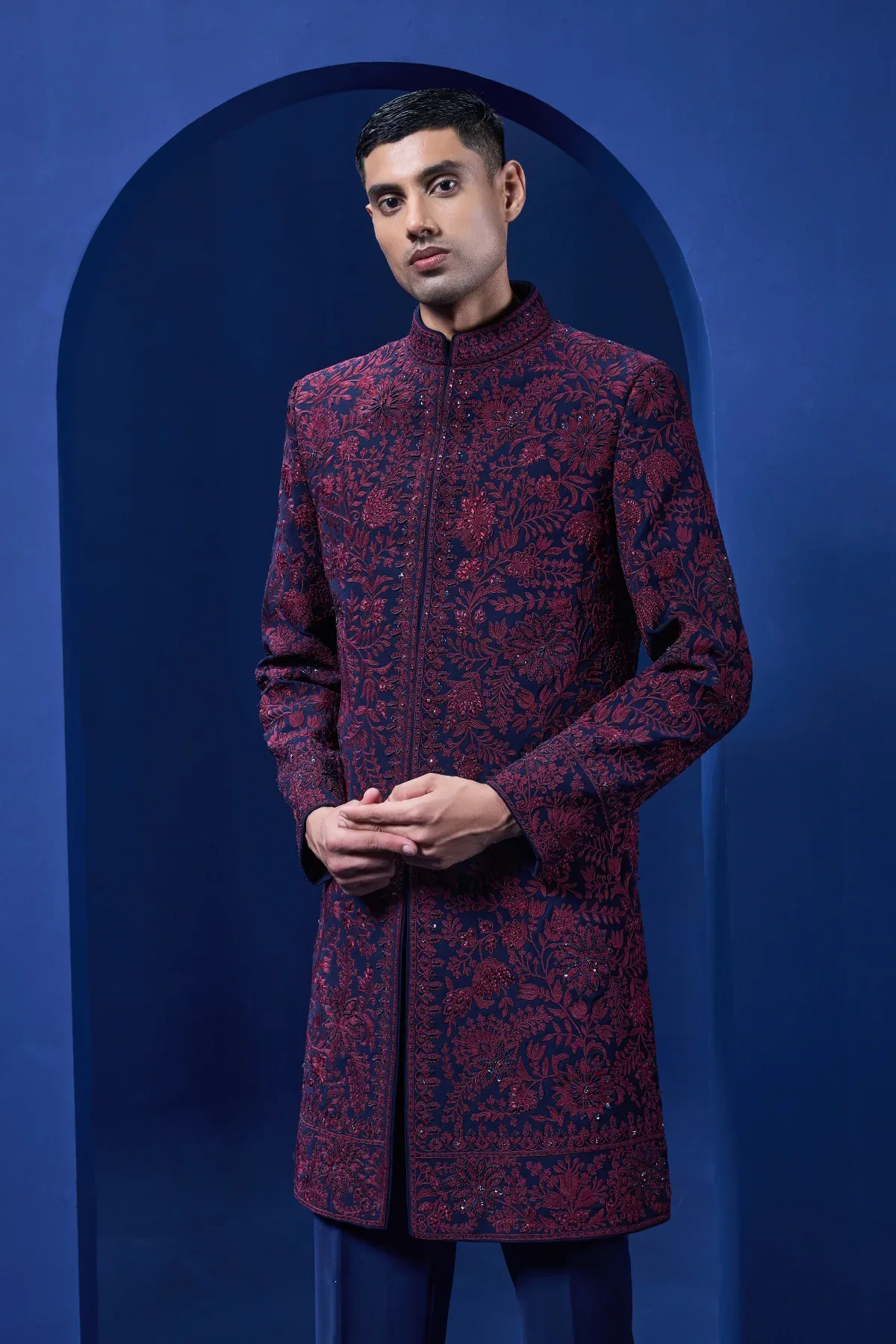 Navy blue Indo Western highlighted with sequins pearls and wine thread work by Sarab Khanijou