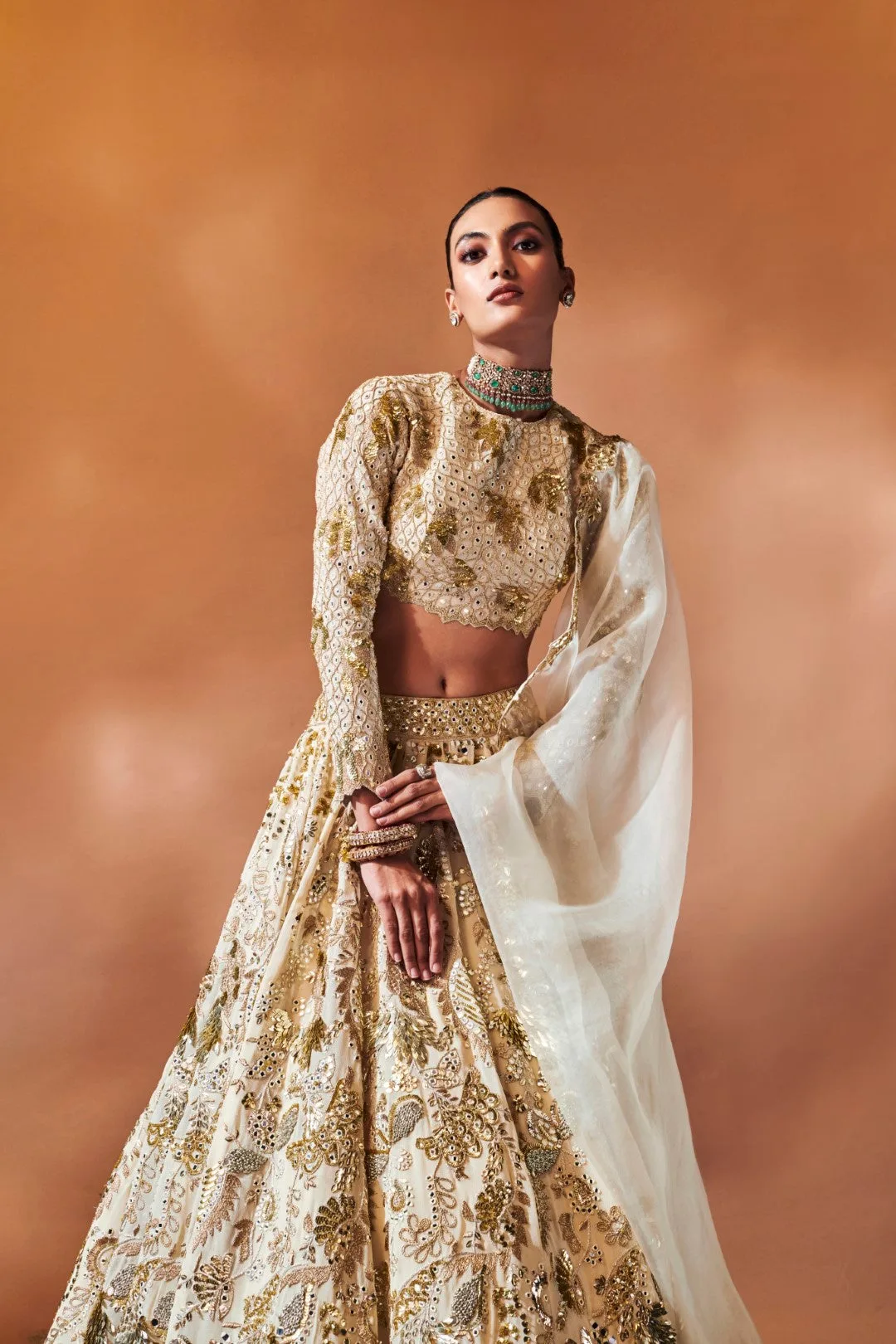 Ivory And Gold Heavily Embroidered Lehenga by Tamanna Punjabi Kapoor, view 2