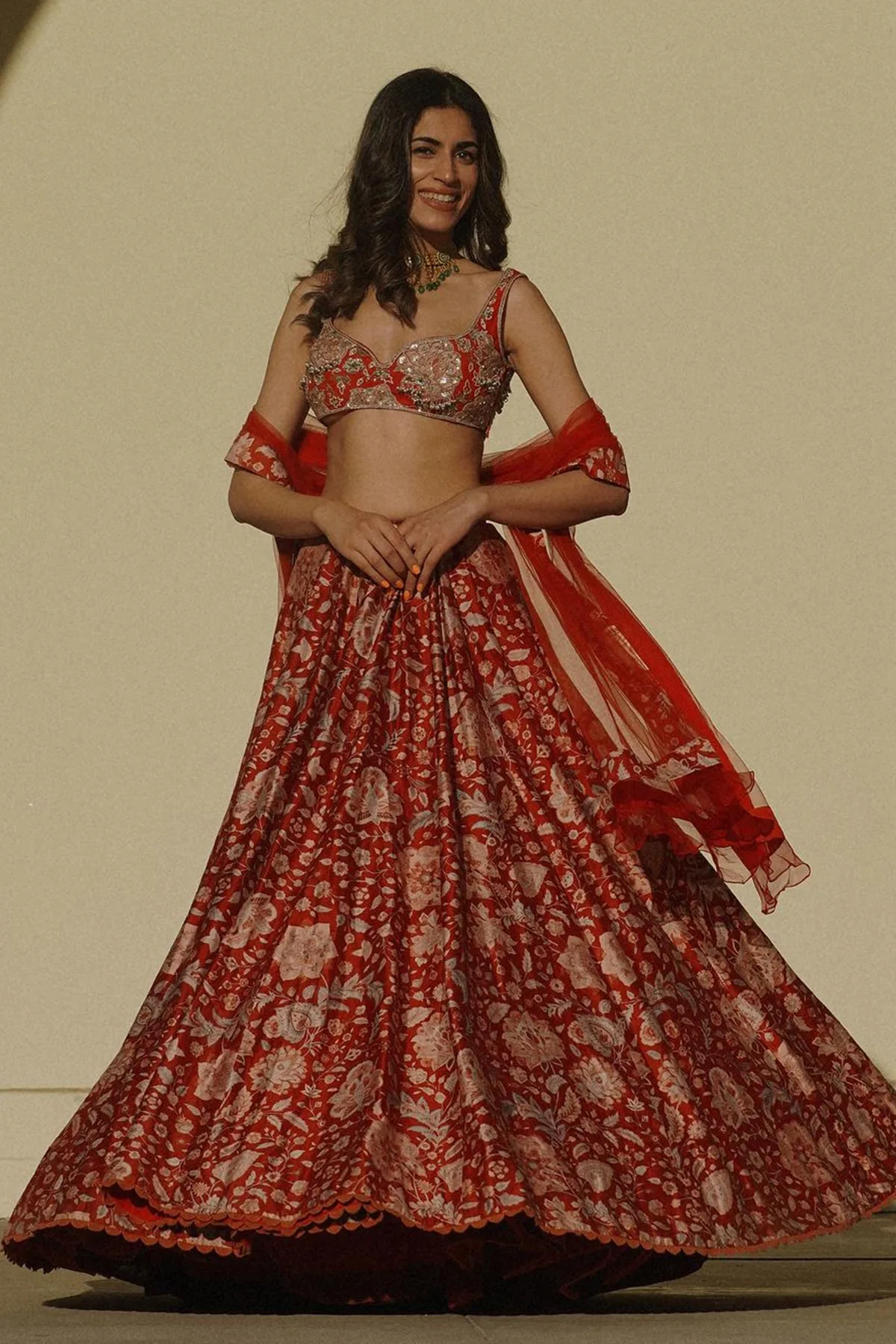Kiran in Demi Lehenga Set by Ridhi Mehra in red