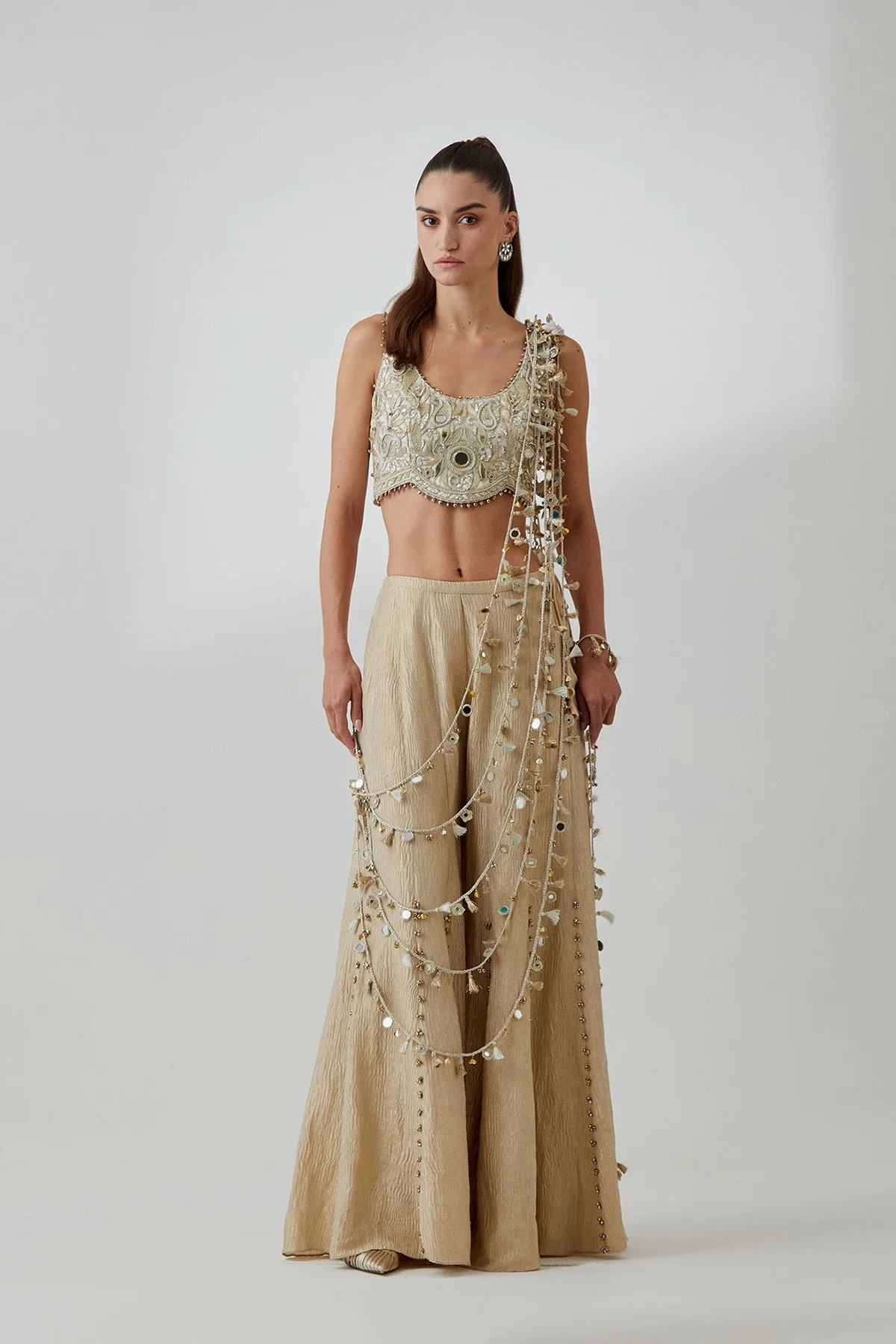 Off-White Organza Embroidered Choli And Gold Crushed Tissue Sharara With Attached Dori Tassels by Payal Singhal in off white