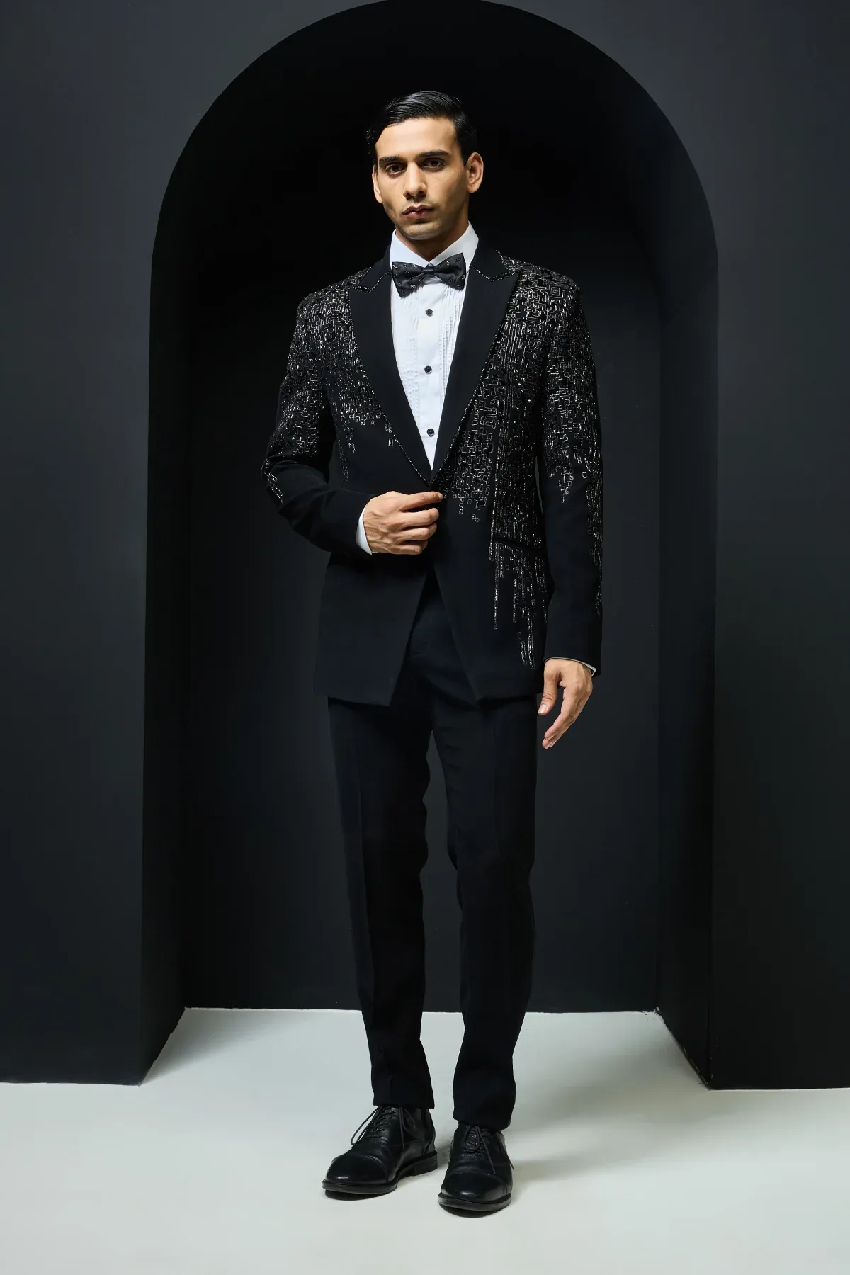 Black sand wash aplic worked tuxedo set by Sarab Khanijou