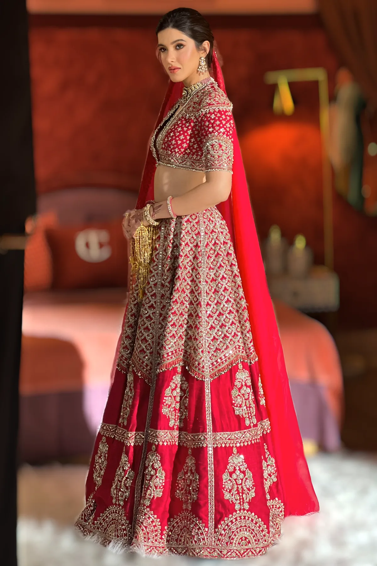 Shanaya Kapoor in Rani Lehenga Set by Ridhi Mehra in red