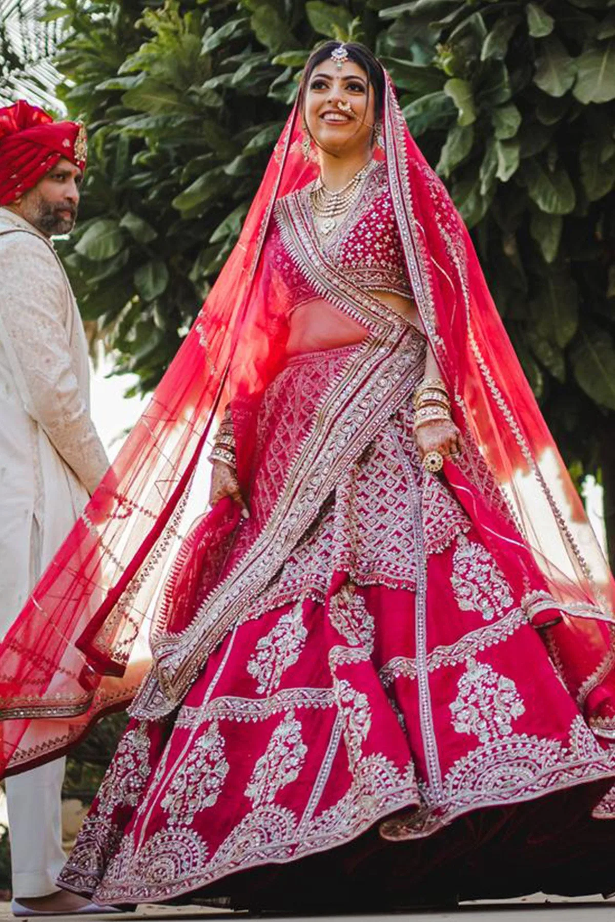 Khyati in Rani Lehenga Set by Ridhi Mehra in red