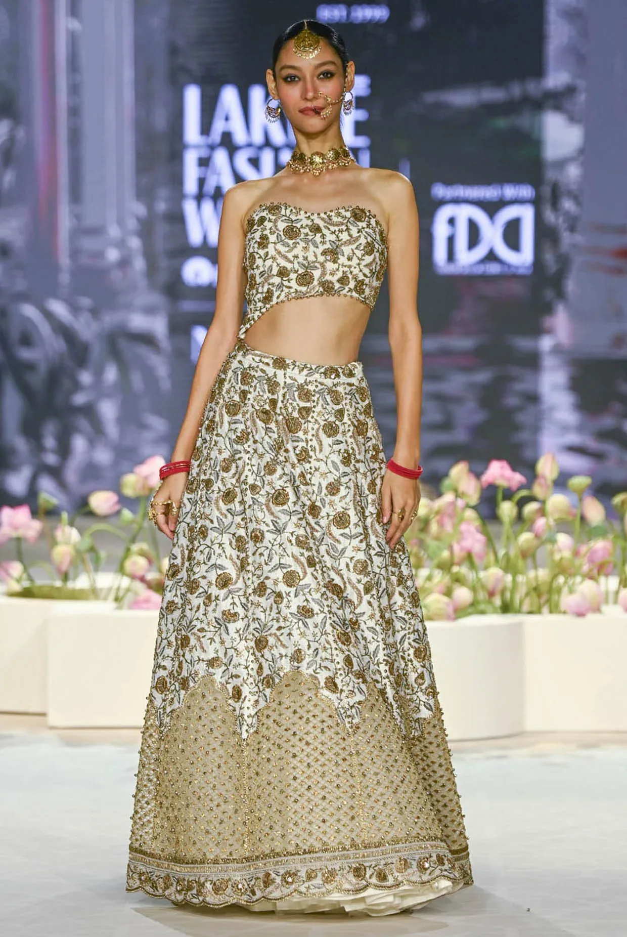 Aasma Off White Embroidered Choli and Lehenga by Payal Singhal