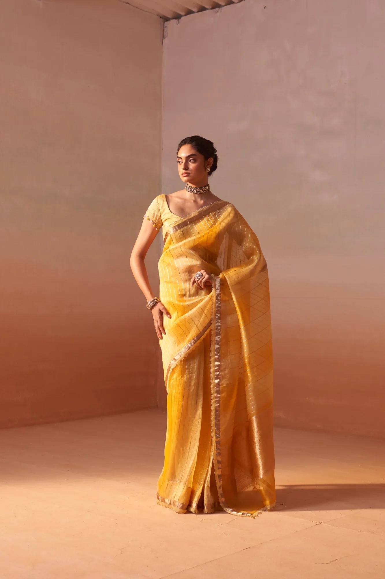 Yellow Organza Saree by Nitika Gujral
