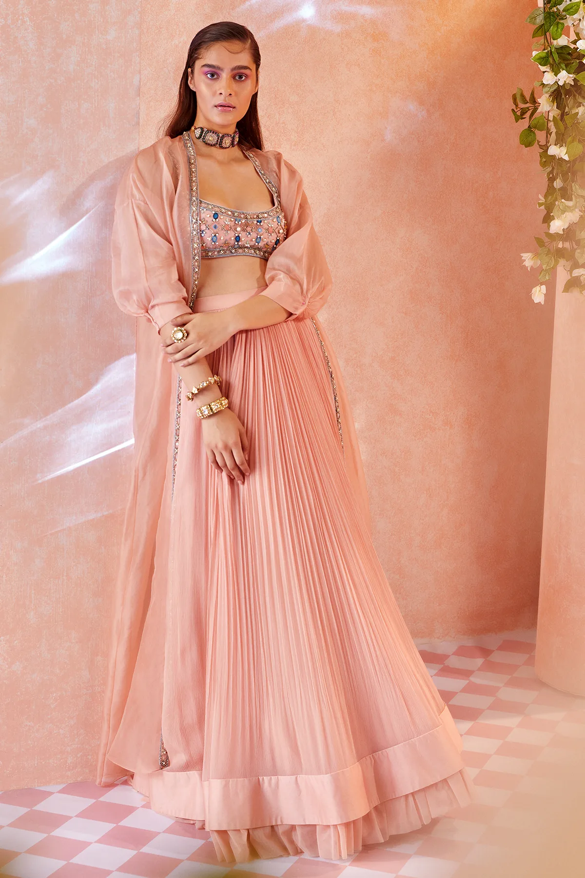 Roxann by Ridhi Mehra, peach lehenga