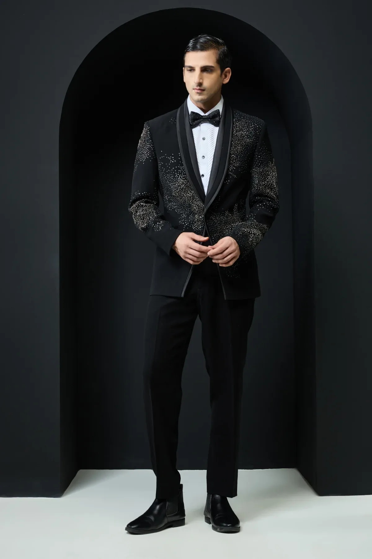 Black tuxedo highlighted with sequins pearls cutdana by Sarab Khanijou