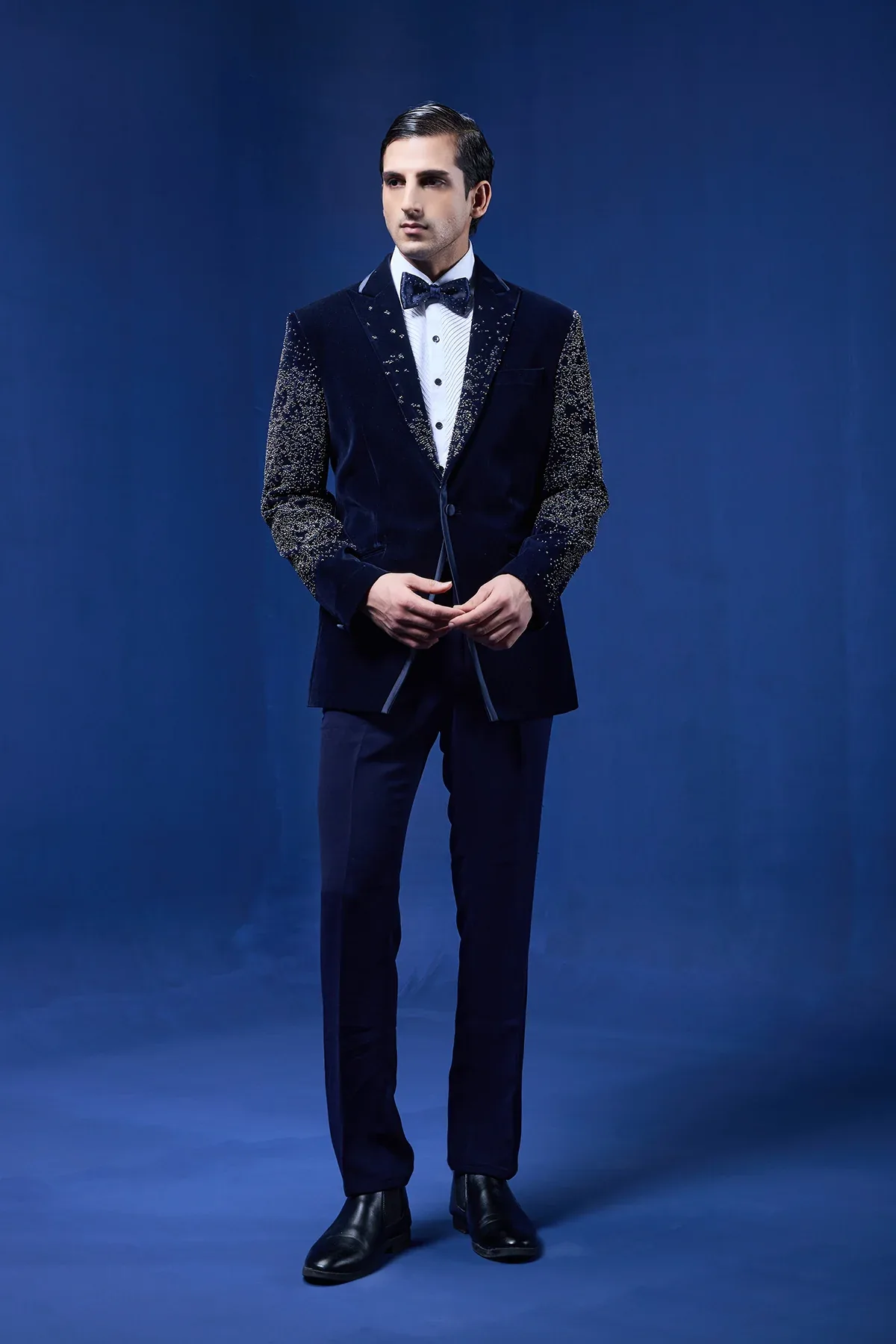 Navy Blue tuxedo highlighted with pearls and sequins by Sarab Khanijou