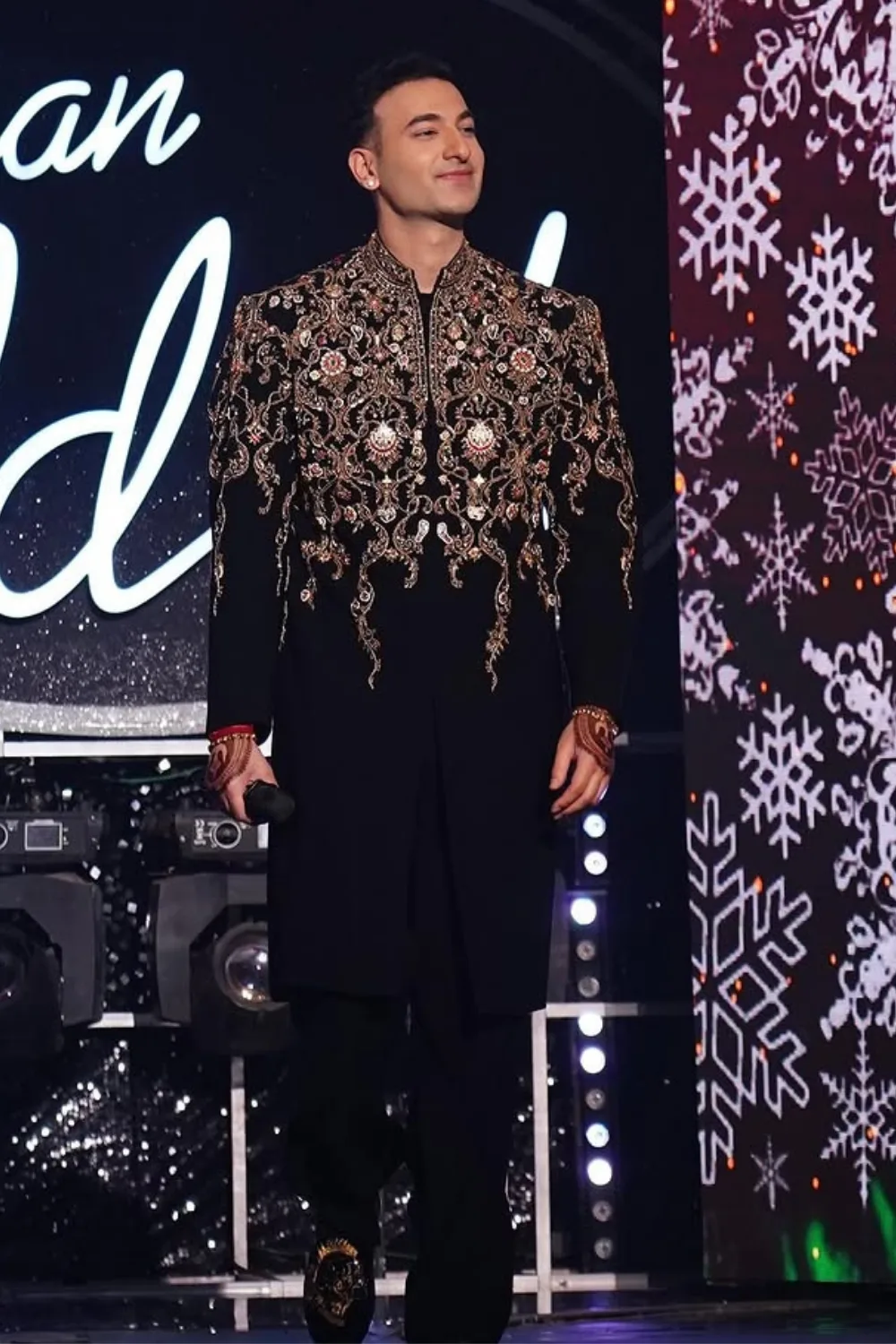 Rishabh Sharma in Kashif Sherwani by Jigar Mali in black