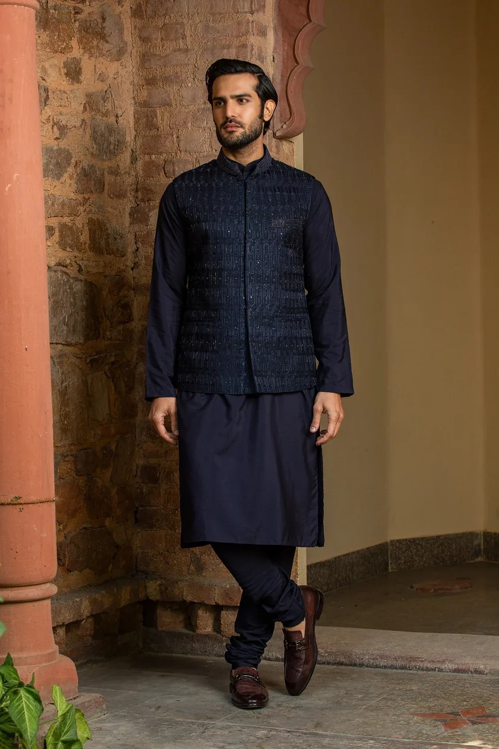 Navy Blue Kurta Churidar with Raw Silk all over Embroidered Nehru Jacket by Nitika Gujral