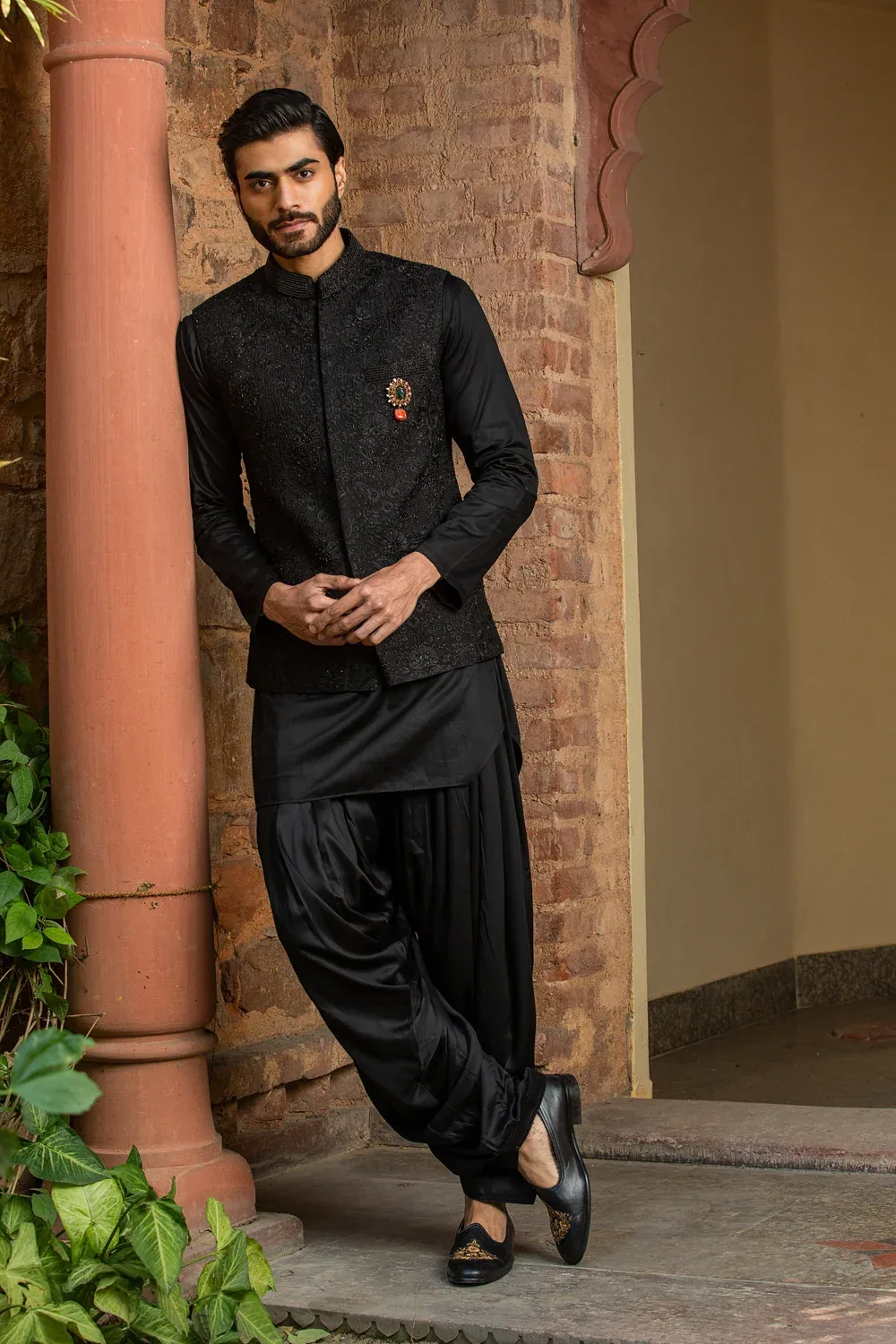 Black Kurta Salwar with Raw Silk all over Embroidered Nehru Jacket by Nitika Gujral