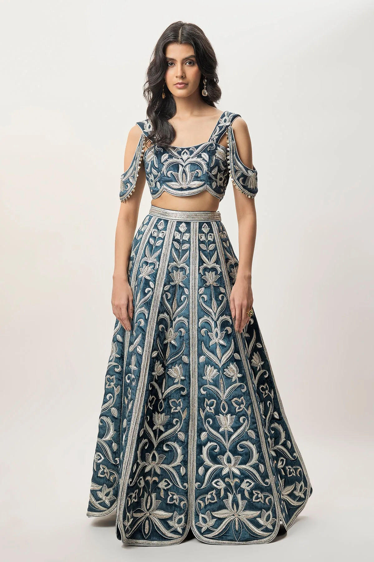 Sahar Navy Blue Velvet Quilted Embroidered Choli with Attached Embroidered Bajuband and Quilted Lehenga. by Payal Singhal