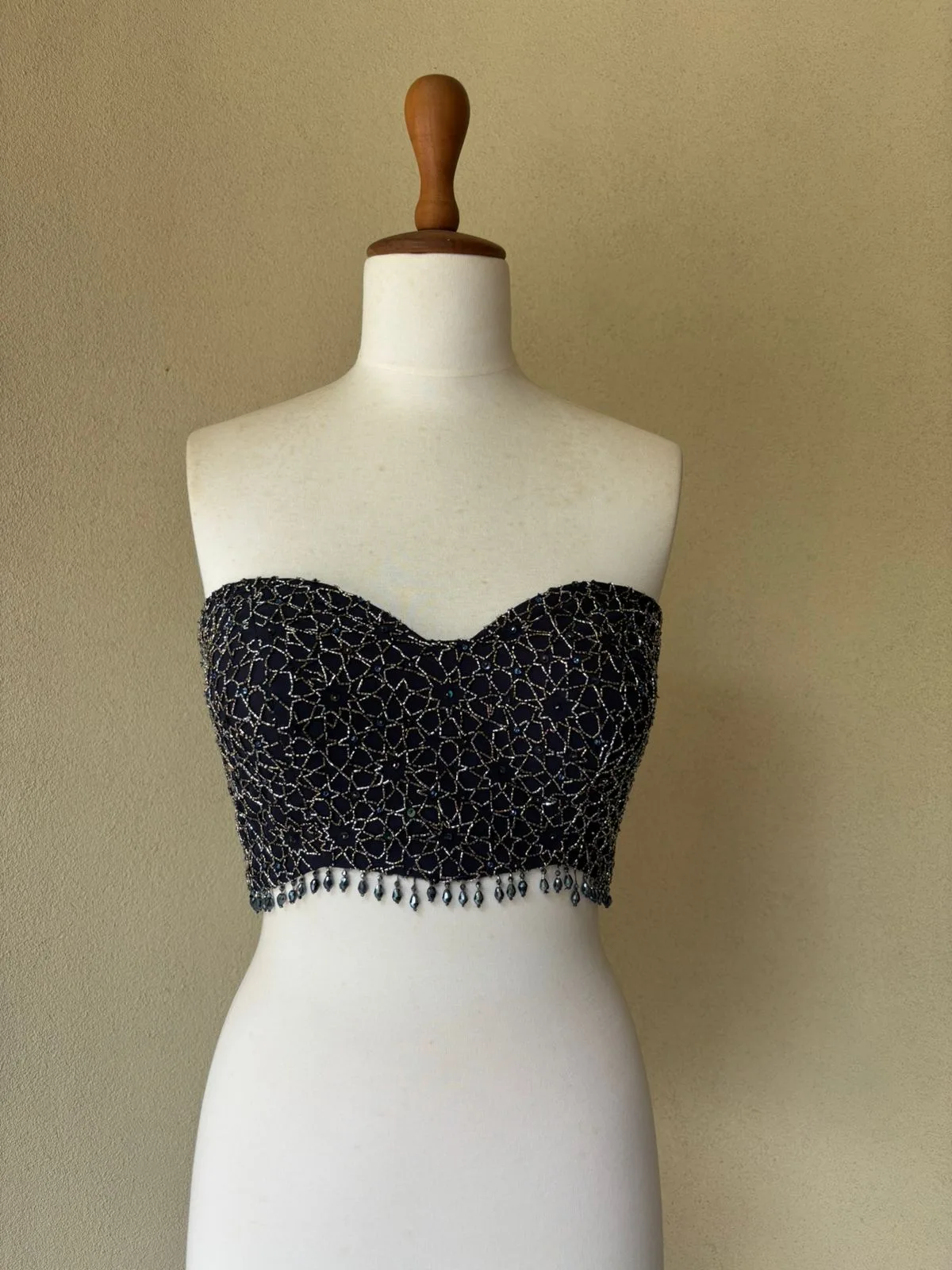 Blue net corset with sequins, cut beads and crystals by Tamanna Punjabi Kapoor