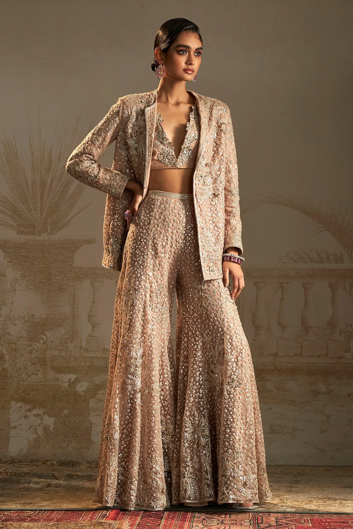 Barfi Pant Suit by Ridhi Mehra in champagne