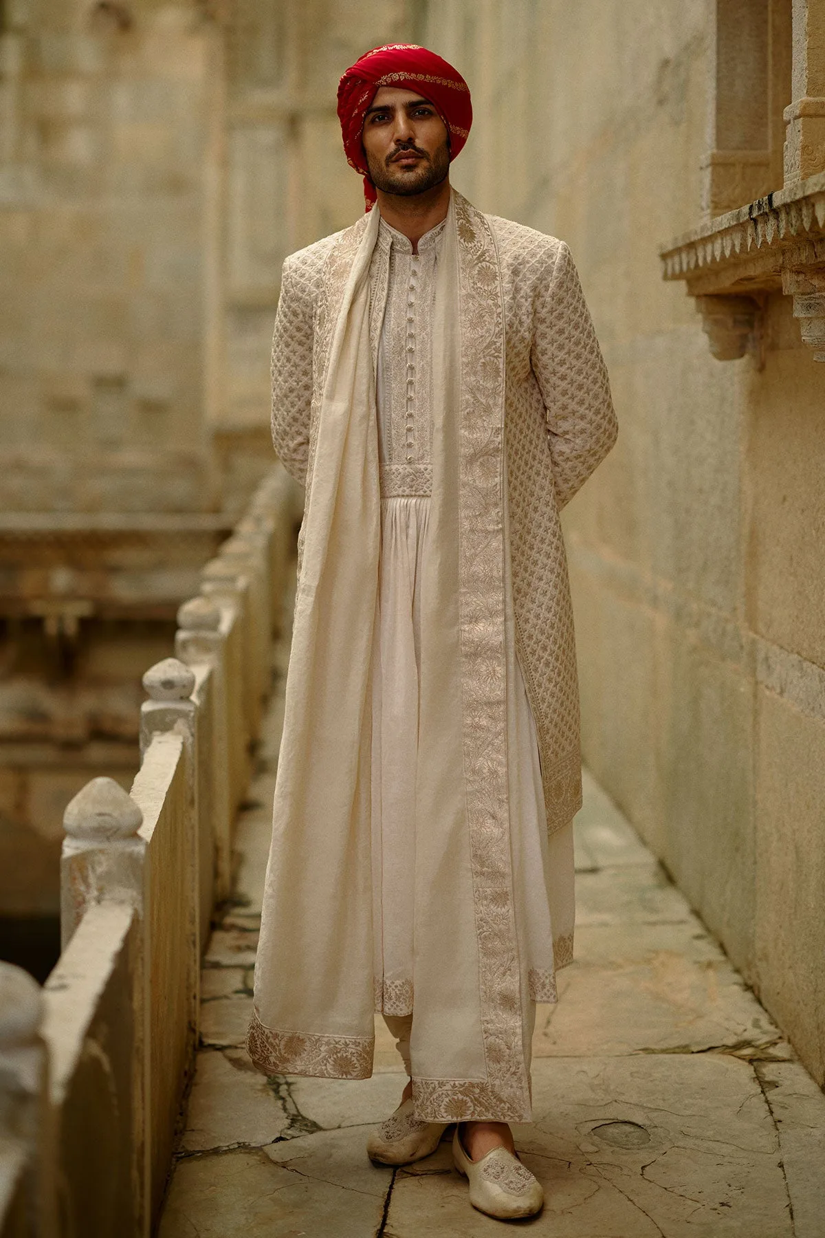 Cream Worked Sherwani Set by Nitika Gujral