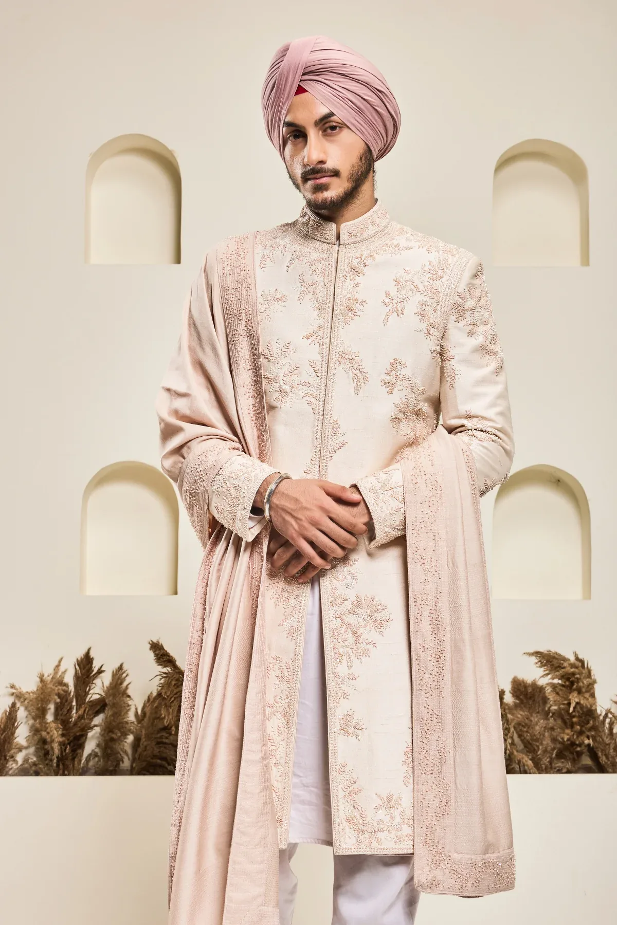 Dusty rose sherwani with pearl sequins critical and spring work by Sarab Khanijou