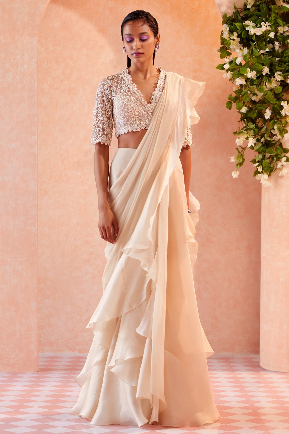 Arsema by Ridhi Mehra, ivory sari